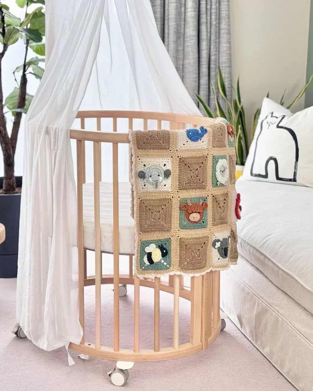 Crochet animal baby blanket made with beginner-friendly pattern