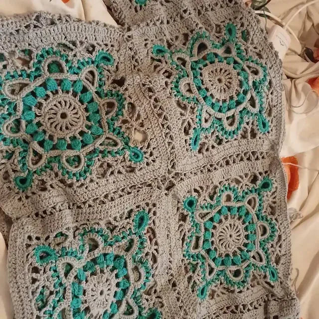 Close-up of a crocheted Turkish granny square top