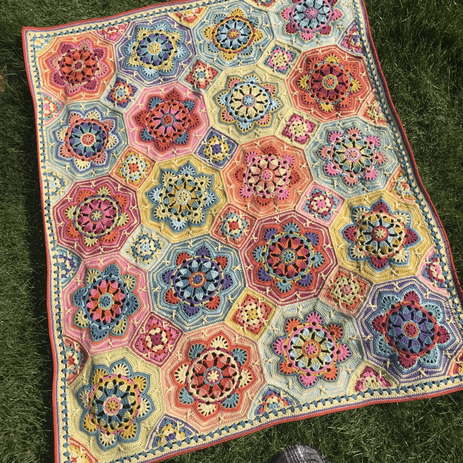 Colorful Persian Tiles crochet blanket flat lay photo