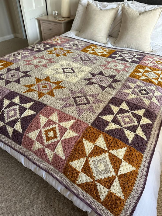 Quiet sky crochet blanket made with soft star-shaped crochet squares