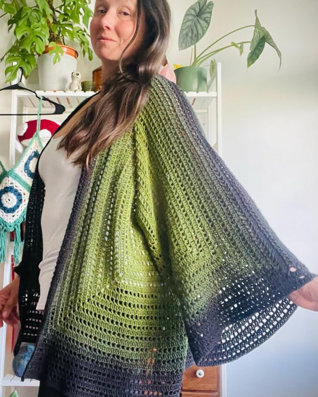 Beginner friendly hexagon cardigan crochet pattern worn as a cozy handmade cardigan