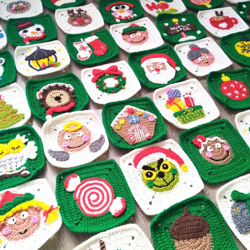 Colorful granny squares made with a crochet Christmas pattern featuring festive designs.
