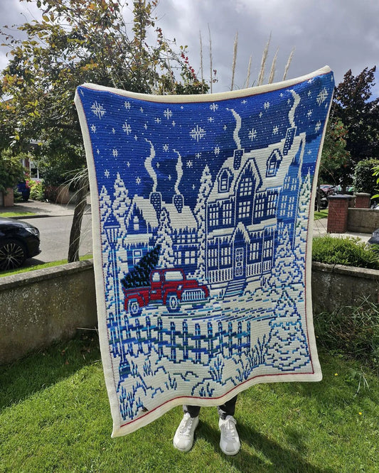 Home for Christmas crochet blanket with winter village design