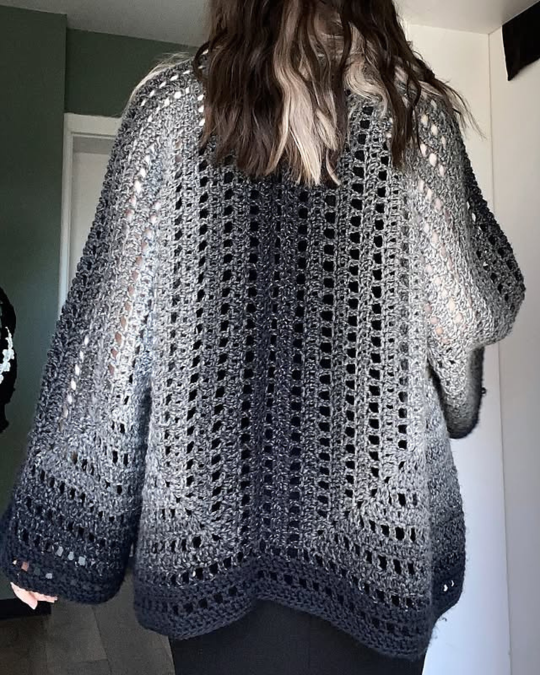 Crocheted hexagon cardigan showing the back of the cardigan