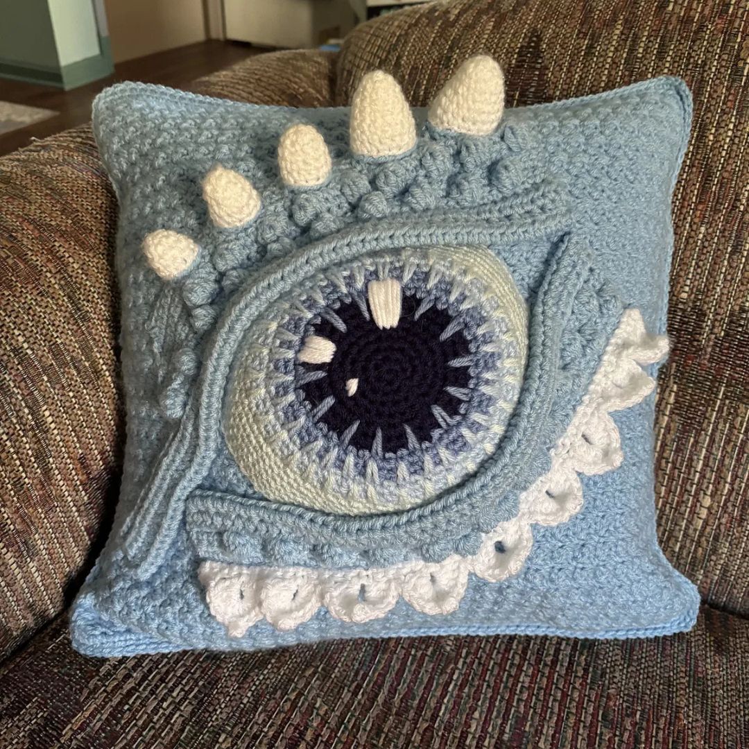 fantasy themed crochet eye dragon pillow home decoration on a sofa