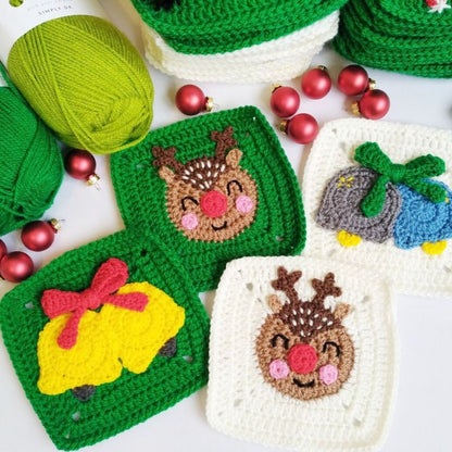 Crocheted granny squares with Christmas-themed designs on a white background