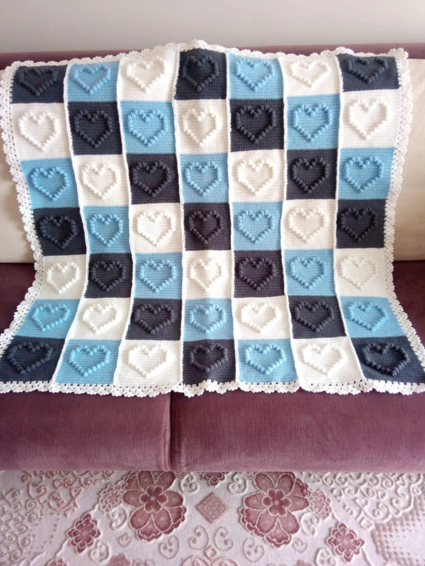 Cozy handmade baby blanket with heart motifs – crochet project